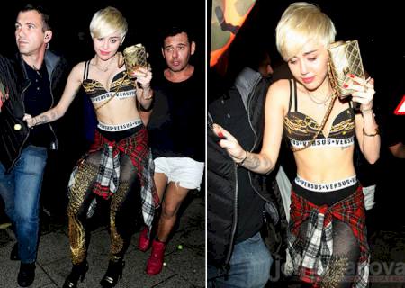 Recuperada, Miley Cyrus sai de balada londrina só de sutiã